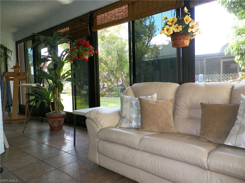 13250 Heather Ridge Loop Fort Myers, FL 33966 - Photo 25 of 35 Air Conditioned Sun Room Opens Up to Enjoy the Gentle Breezes