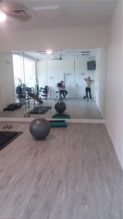 13250 Heather Ridge Loop Fort Myers, FL 33966 - Photo 33 of 35 LARGE REMODELED FITNESS ROOM...PLENTY OF SPACE FOR YOGA OR FLOOR EXERCISES