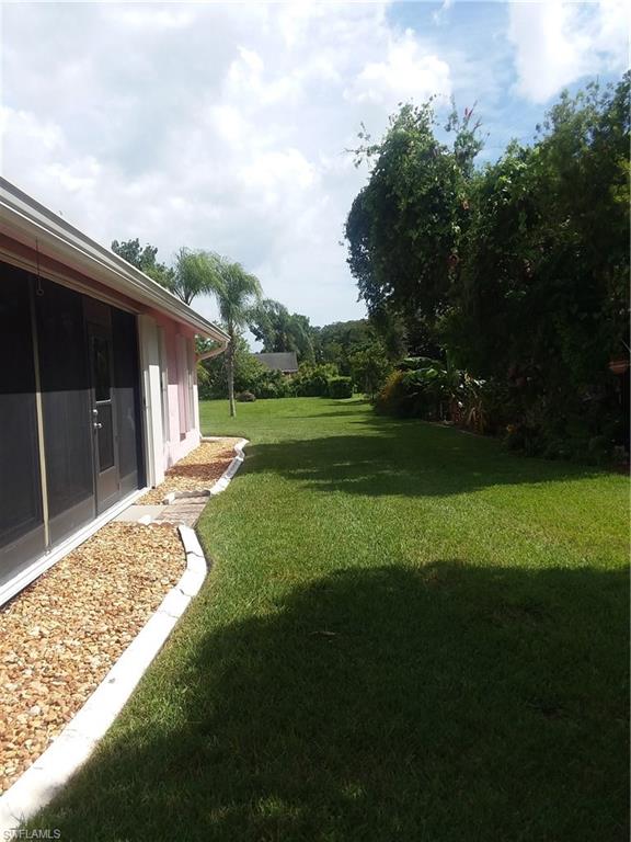 13250 Heather Ridge Loop Fort Myers, FL 33966 - Photo 5 of 35 REAR ELEVATION/ BACKYARD