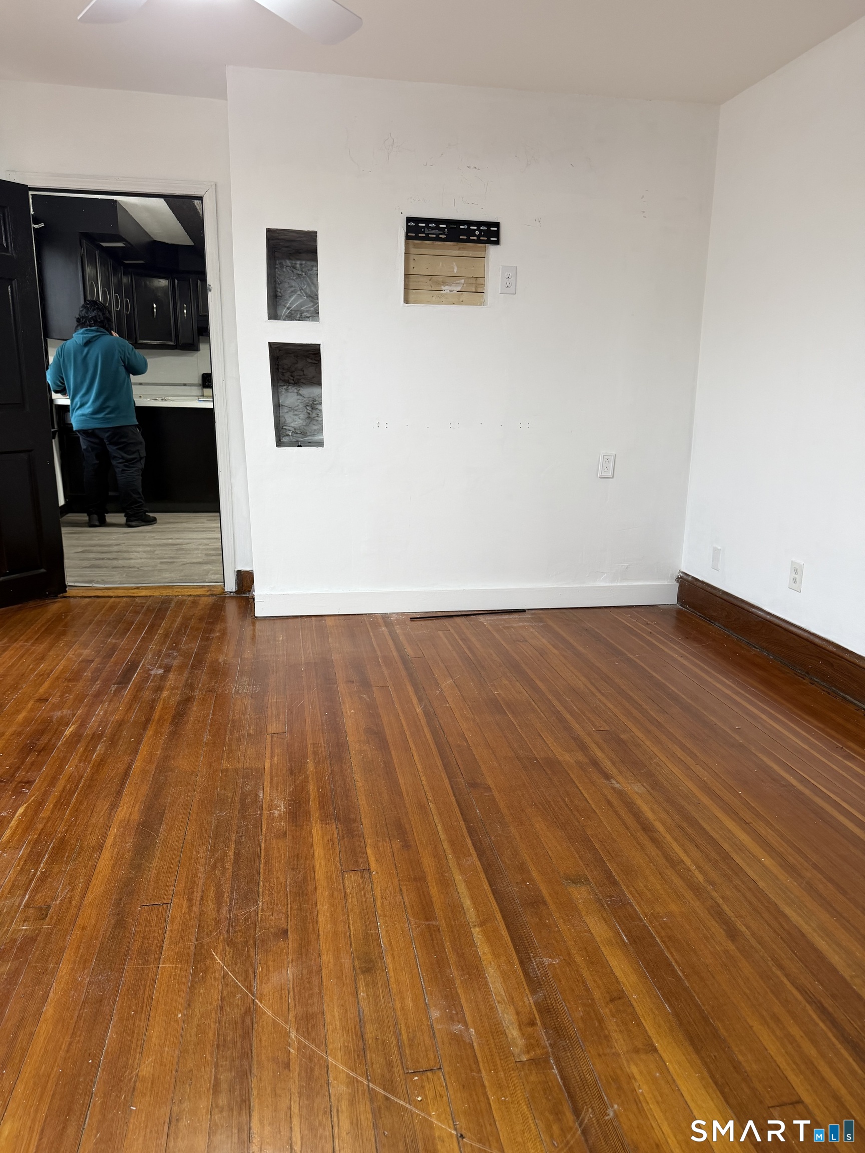 16 St Lawrence Street Manchester, CT 06040 - Photo 6 of 6 a view of a livingroom with wooden floor