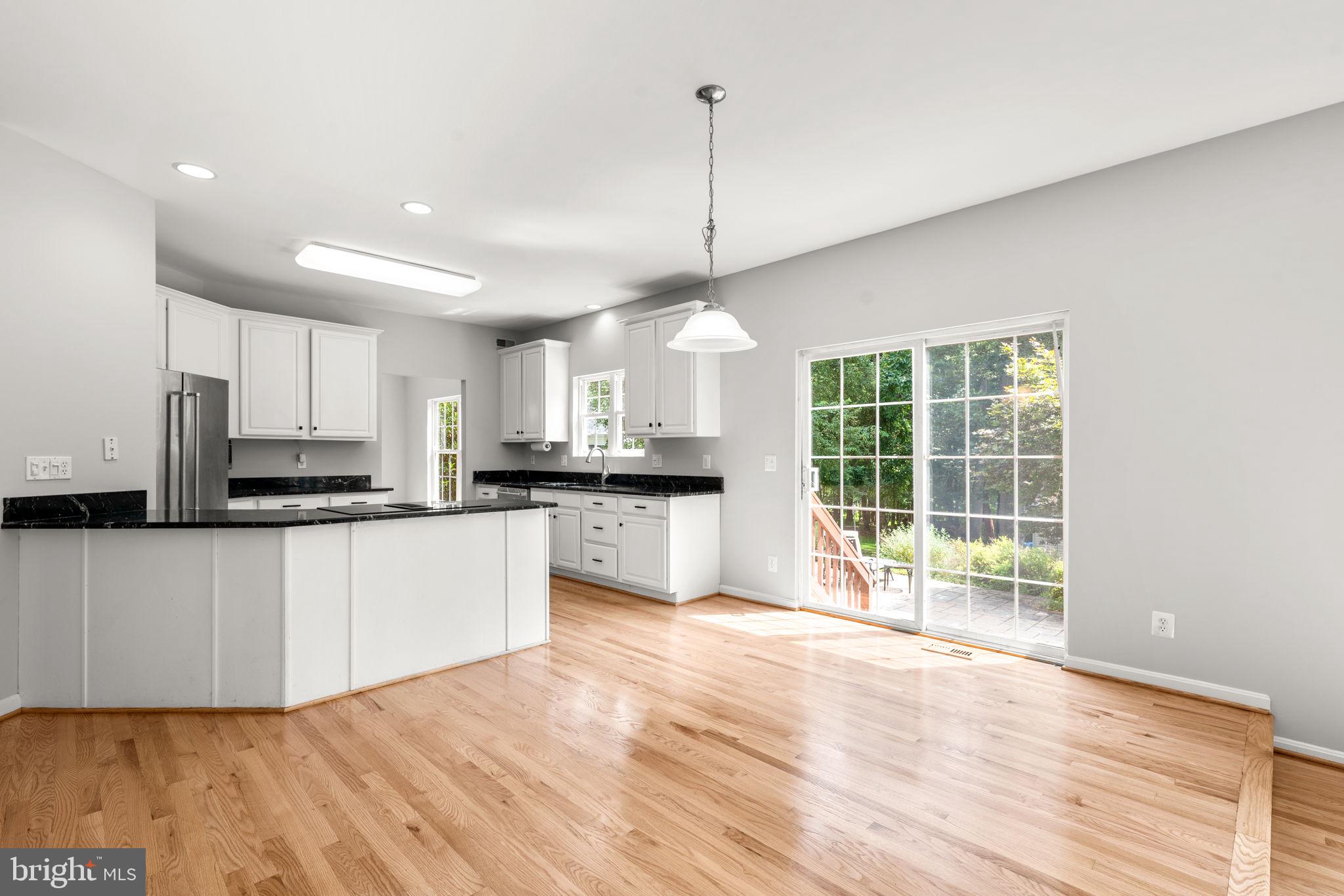 15066 Frederick Road Woodbine, MD 21797 - Photo 16 of 72 Refinished Hardwood flooring kitchen