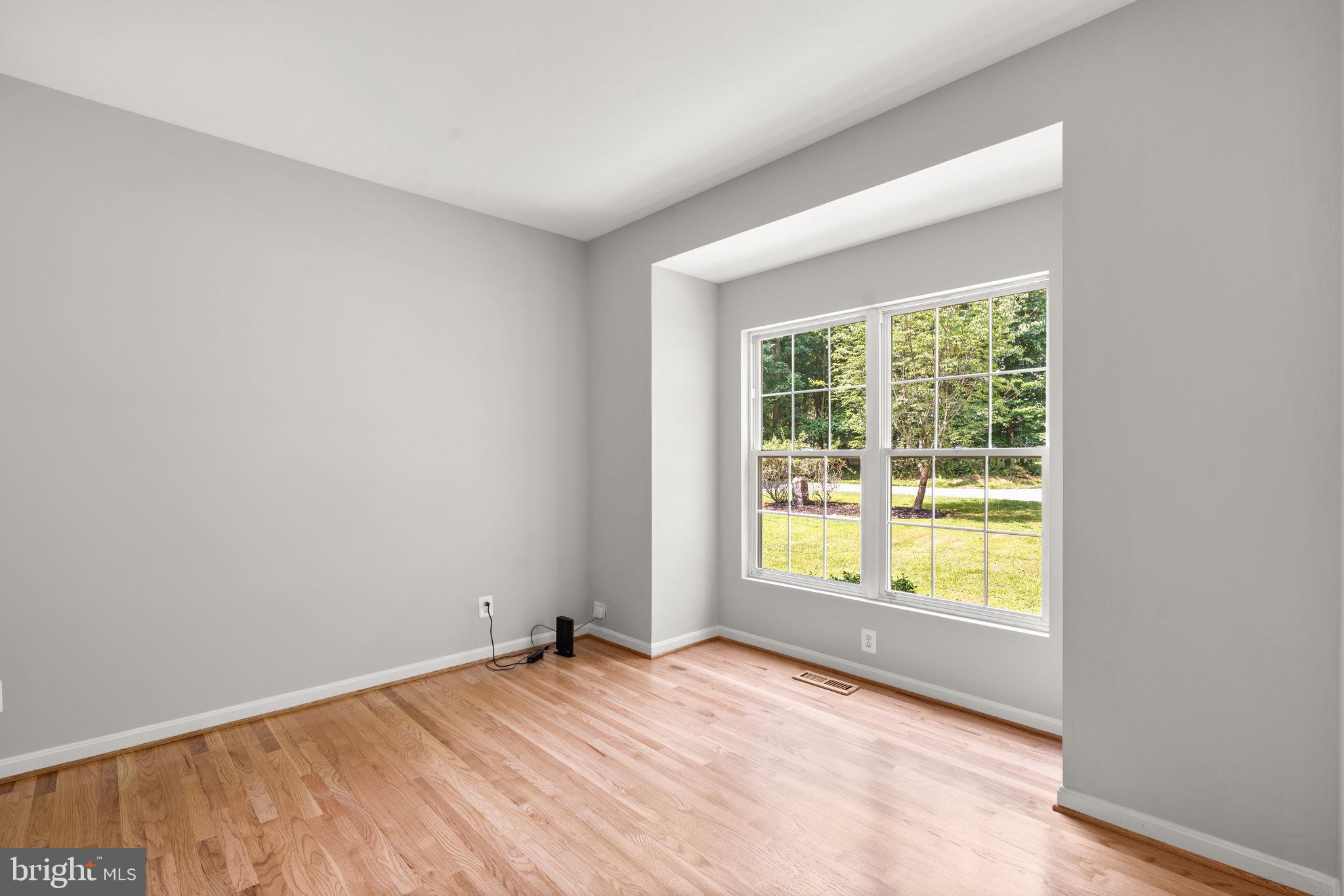 15066 Frederick Road Woodbine, MD 21797 - Photo 34 of 72 Refinished Hardwood flooring downstairs office