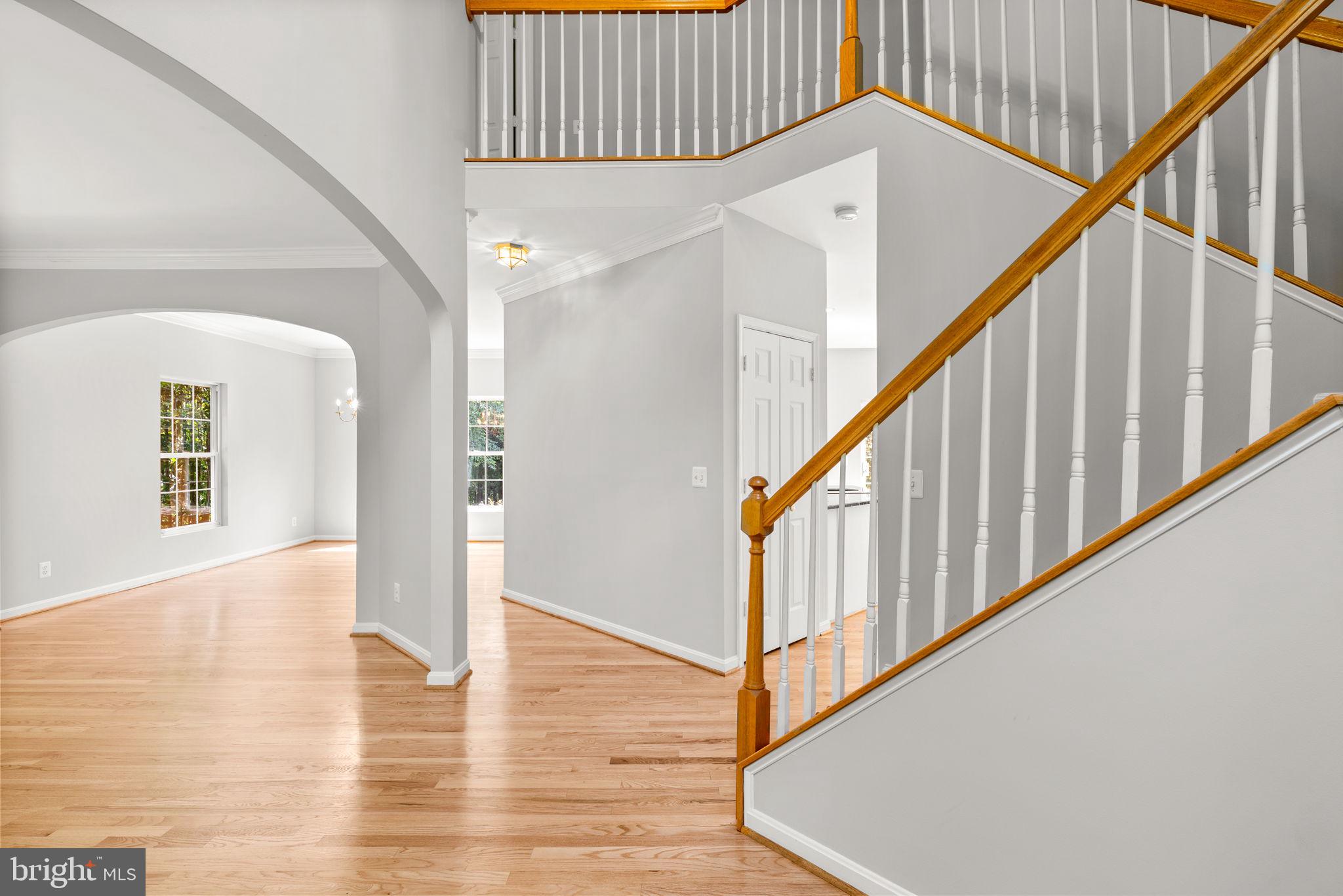 Refinished Hardwood flooring foyer