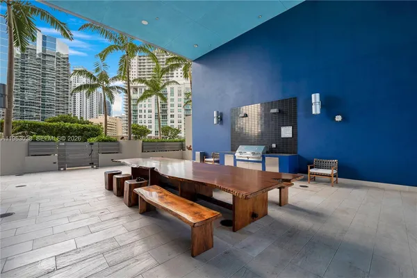 a building outdoor space with patio furniture