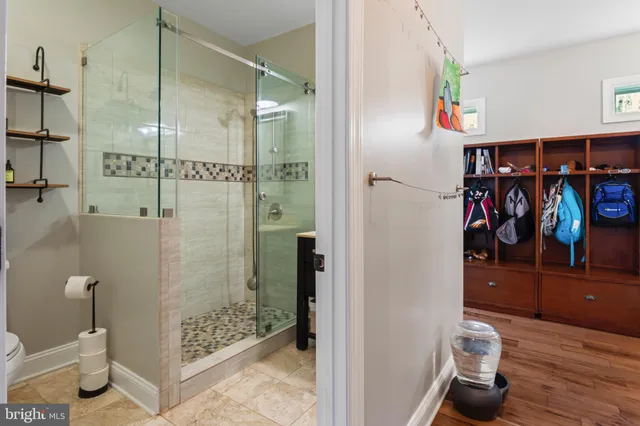 a view of a livingroom with furniture and windows