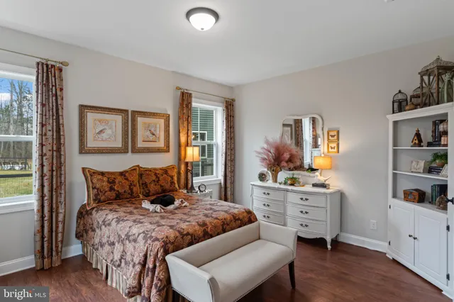 a backyard of a house with outdoor seating