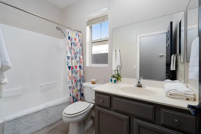 a house view with a sitting space and garden