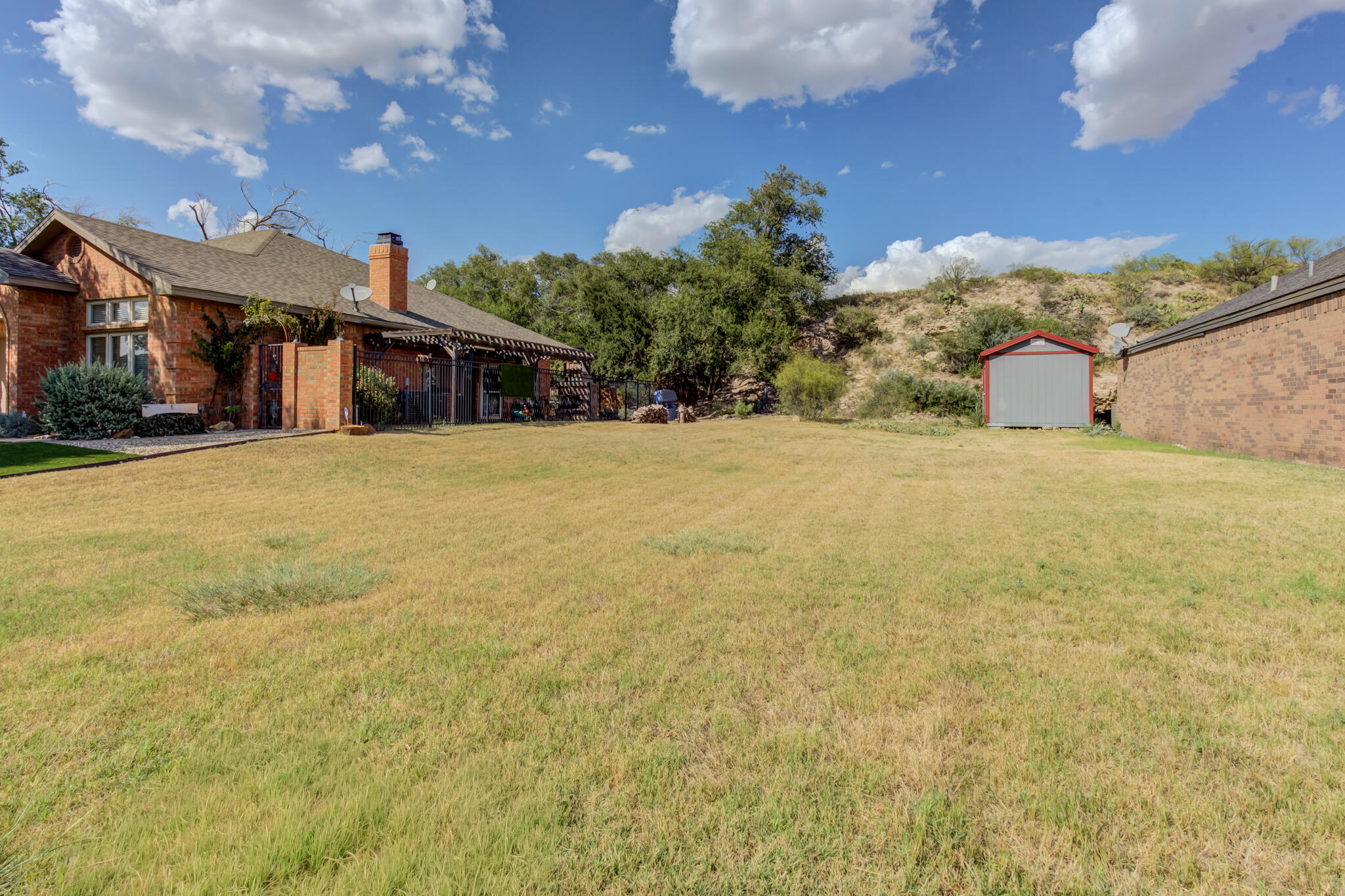 28 West Lakeshore Drive Ransom Canyon, TX 79366 - Photo 2 of 3 a front view of a house with a yard