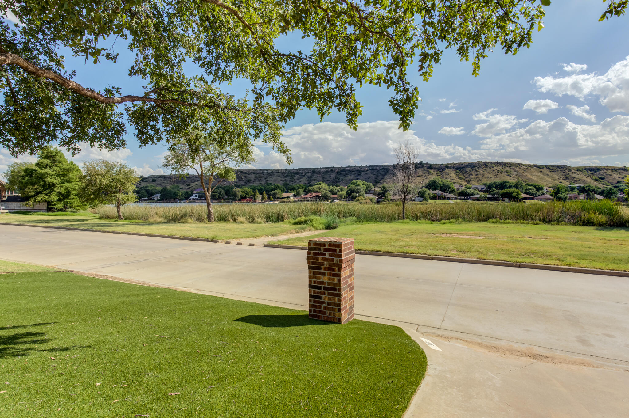 28 West Lakeshore Drive Ransom Canyon, TX 79366 - Photo 3 of 3 a view of a garden with an outdoor space