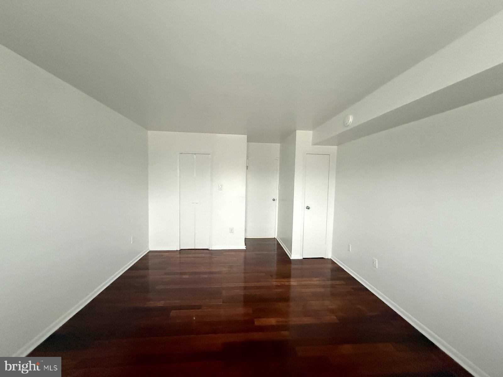 606 Cooper Landing Road, Unit B6F Cherry Hill, NJ 08002 - Photo 9 of 11 a view of room with window and hardwood floor