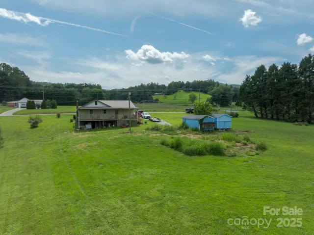 a view of a house with a big yard