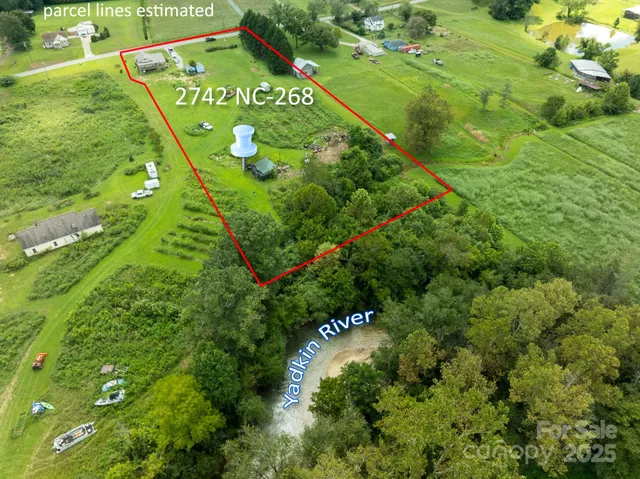 a close up of a sign in a garden