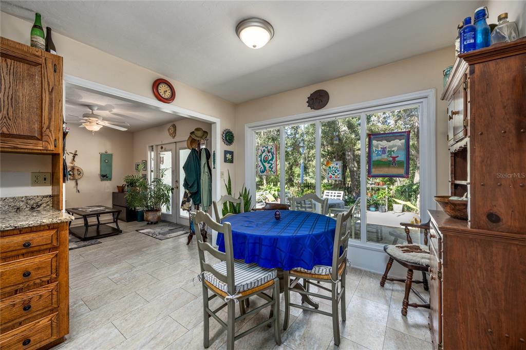 11440 Southwest Archer Road Gainesville, FL 32608 - Photo 19 of 44 a view of a livingroom with furniture window and outside view