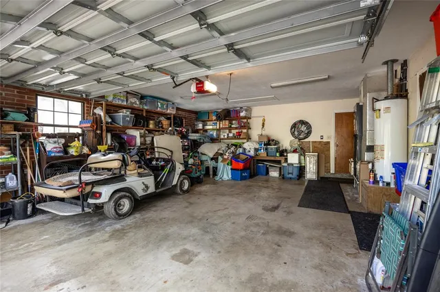 a view of parking garage with cars