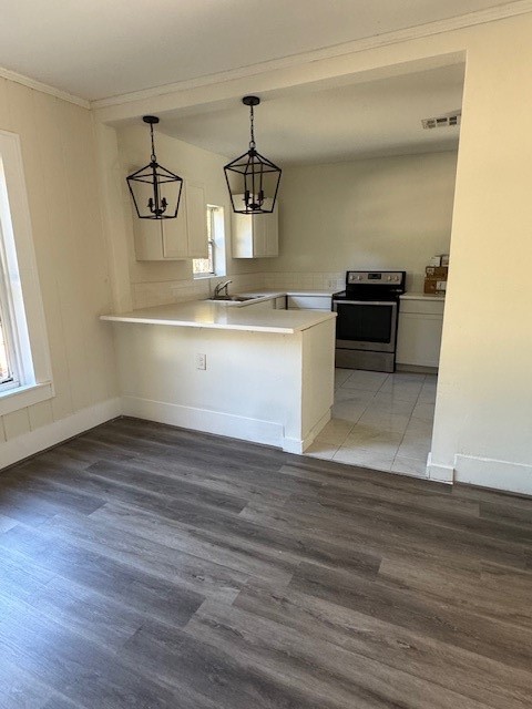1616 North Travis Street Liberty, TX 77575 - Photo 18 of 23 a view of storage and utility room in wooden floor