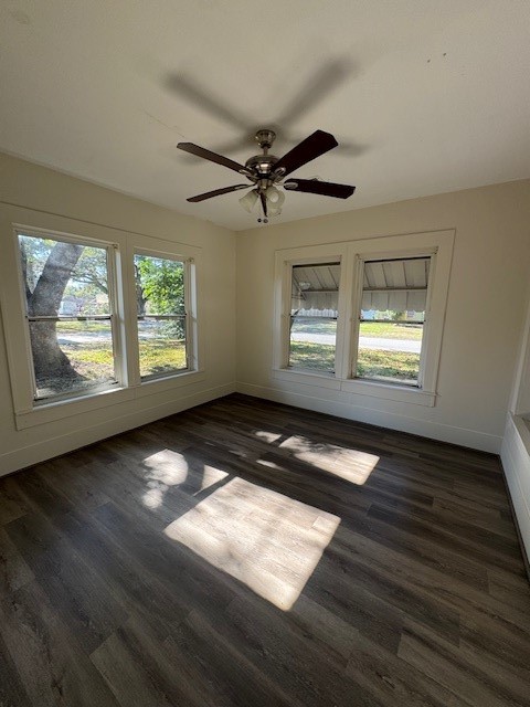 1616 North Travis Street Liberty, TX 77575 - Photo 22 of 23 wooden floor in an empty room with a window