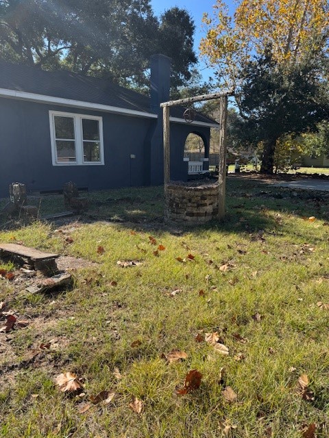 1616 North Travis Street Liberty, TX 77575 - Photo 8 of 23 a view of a house with a yard
