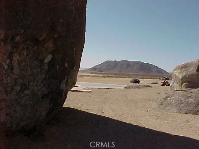 a view of backyard with furniture