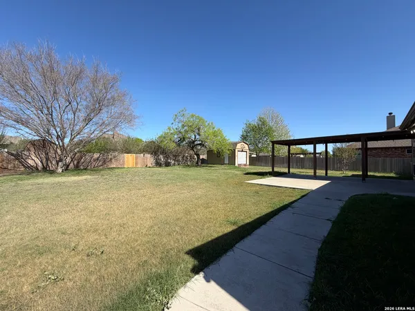 a view of an outdoor space and swimming pool