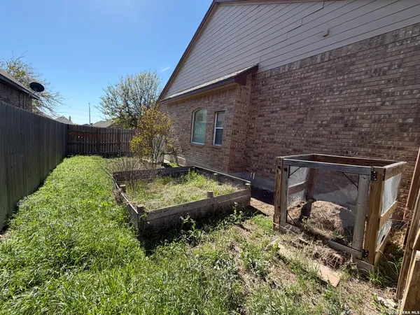 a backyard of a house with lots of green space