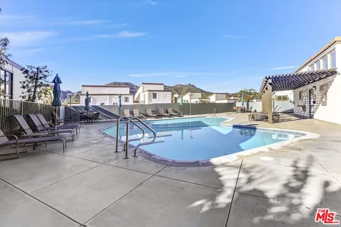 a view of a terrace with chairs