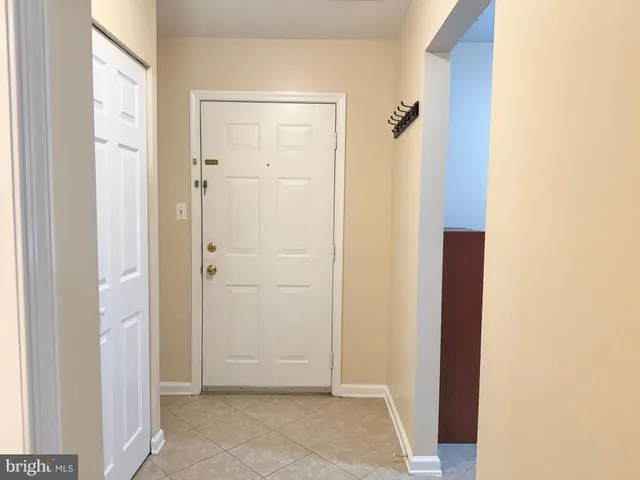 a view of a bathroom from a hallway