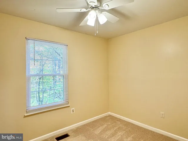 a view of a window in an empty room