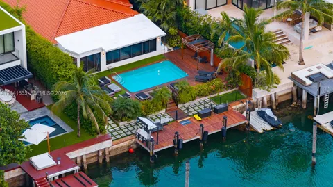 an aerial view of a house with a garden