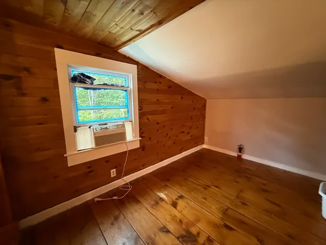 a bathroom with a sink toilet and mirror