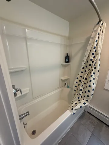 a view of closet area with empty racks