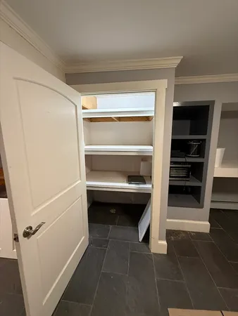 a bathroom with a sink and mirror