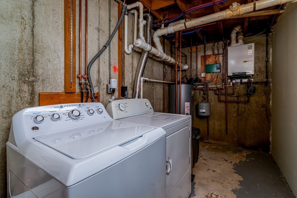 137 Deer Bay Road Ashby, MA 01431 - Photo 21 of 21 a utility room with dryer and washer
