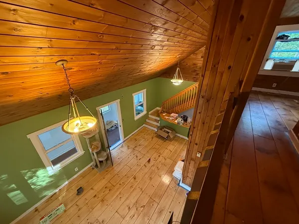 a view of a balcony with chairs