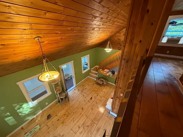 a view of a balcony with chairs