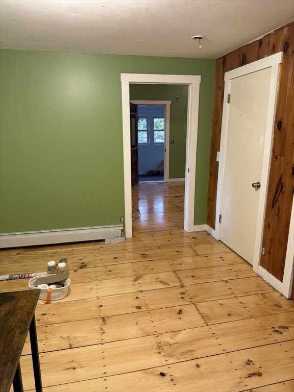 137 Deer Bay Road Ashby, MA 01431 - Photo 9 of 21 a view of a room with wooden floor and bathroom