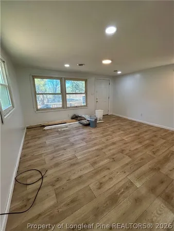 an empty room with windows