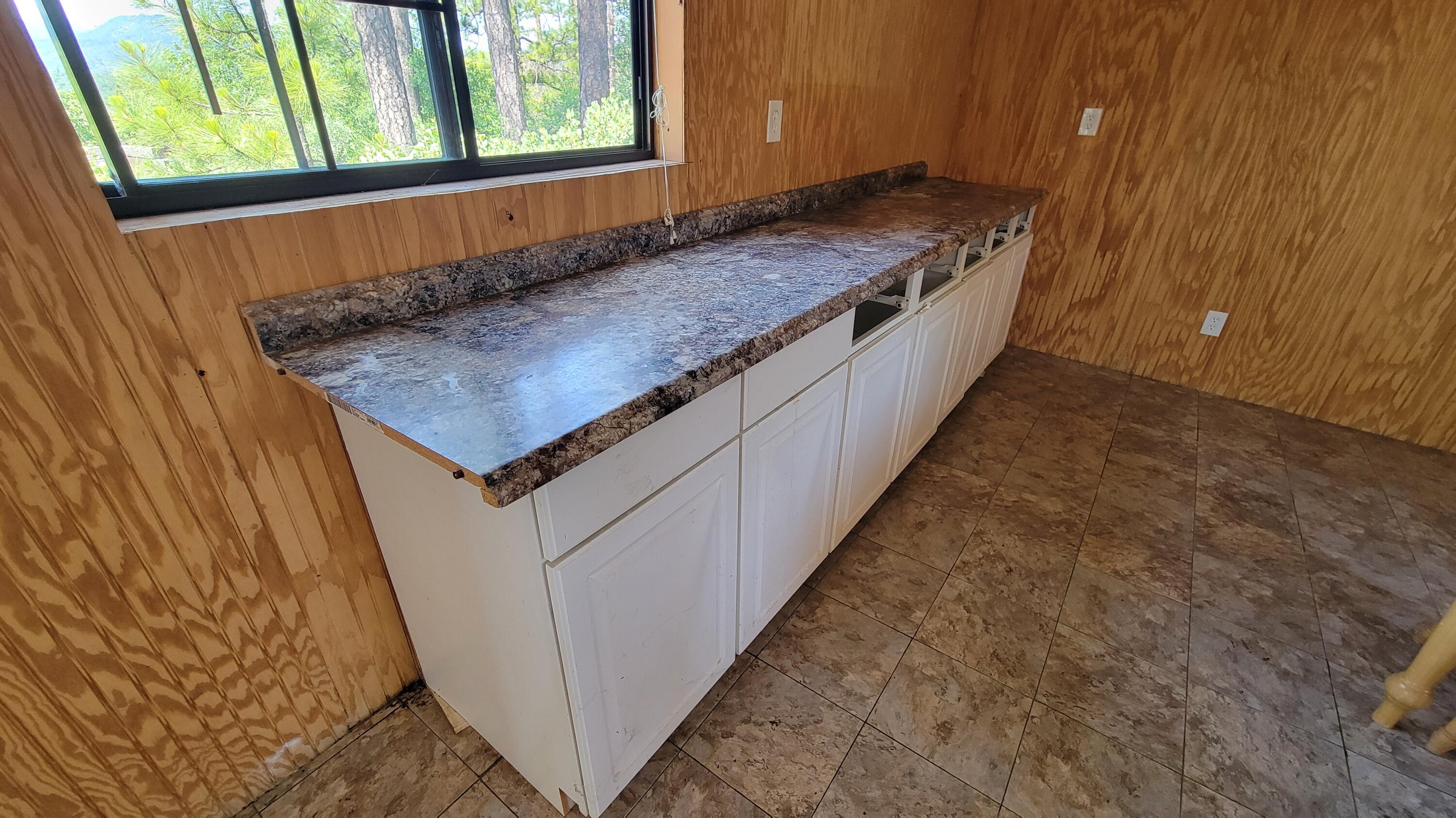 0 Backbone Road Bella Vista, CA 96008 - Photo 12 of 38 a hallway with washer and dryer