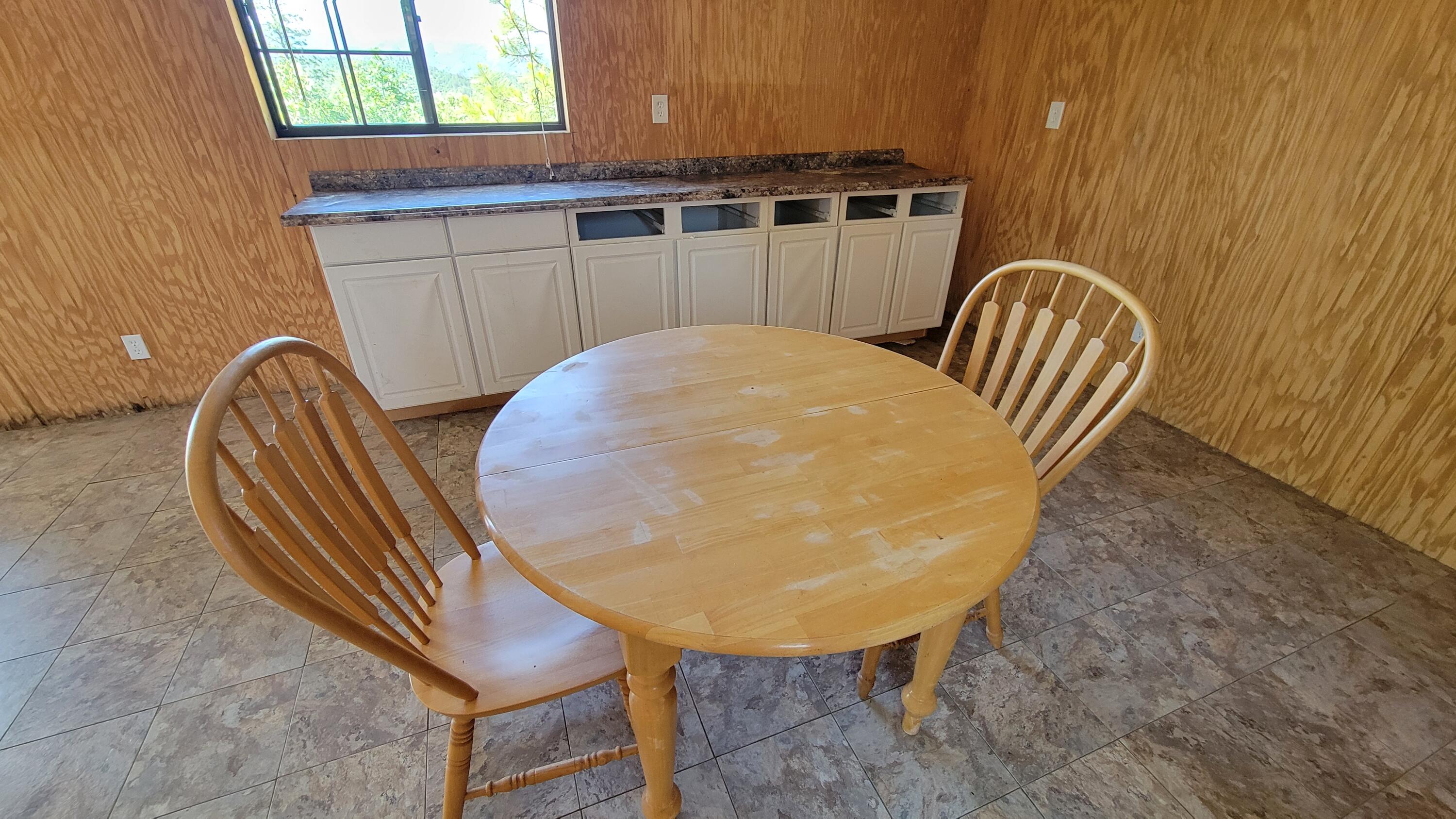 0 Backbone Road Bella Vista, CA 96008 - Photo 13 of 38 a view of a chair and table in the kitchen