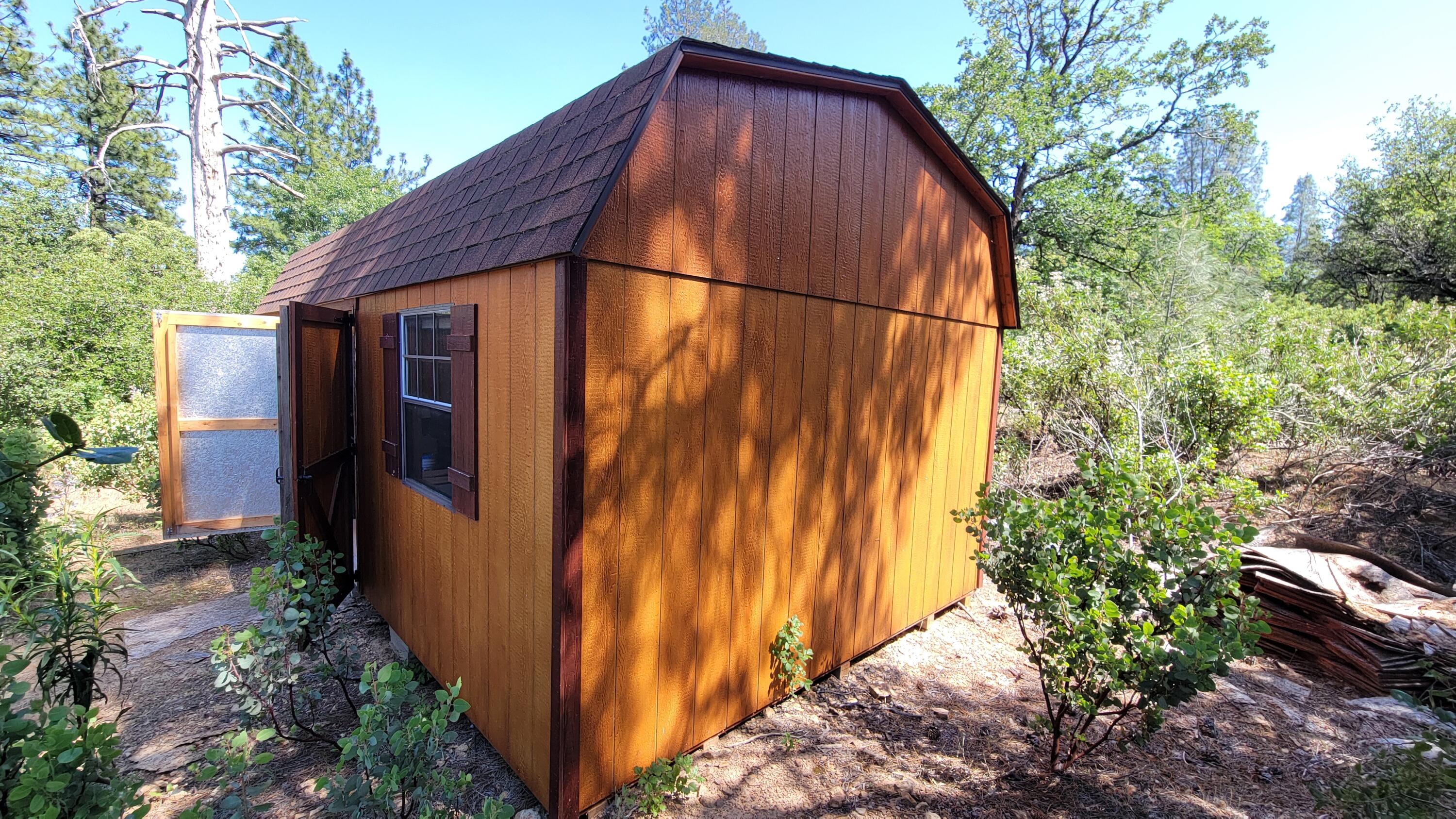 0 Backbone Road Bella Vista, CA 96008 - Photo 17 of 38 a backyard of a house with lots of green space
