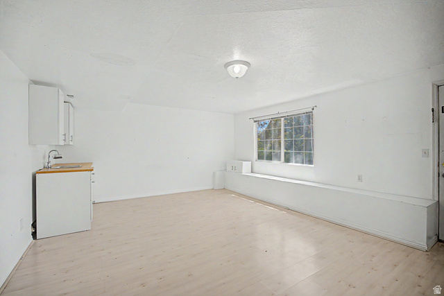 2058 California Avenue, Unit 2 Provo, UT 84606 - Photo 15 of 32 Bright interior space with light wood-finish flooring