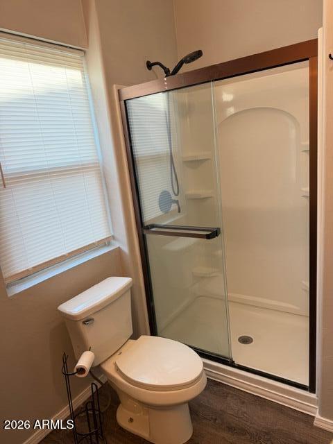 1129 11th Street Douglas, AZ 85607 - Photo 8 of 13 a bathroom with a toilet and a shower