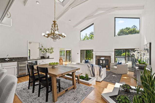 a kitchen with stainless steel appliances granite countertop a stove and a sink