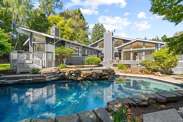 a view of backyard with green space
