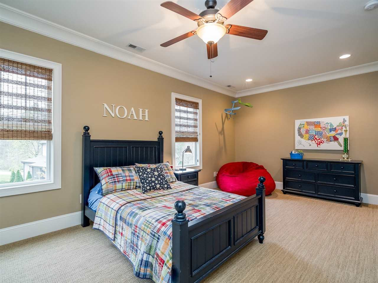 3316 Bryant Falls Court Raleigh, NC 27613 - Photo 22 of 30 Walk in closet with custom shelves, private access to bathroom, access to unfinished storage space and ceiling fan Bedroom