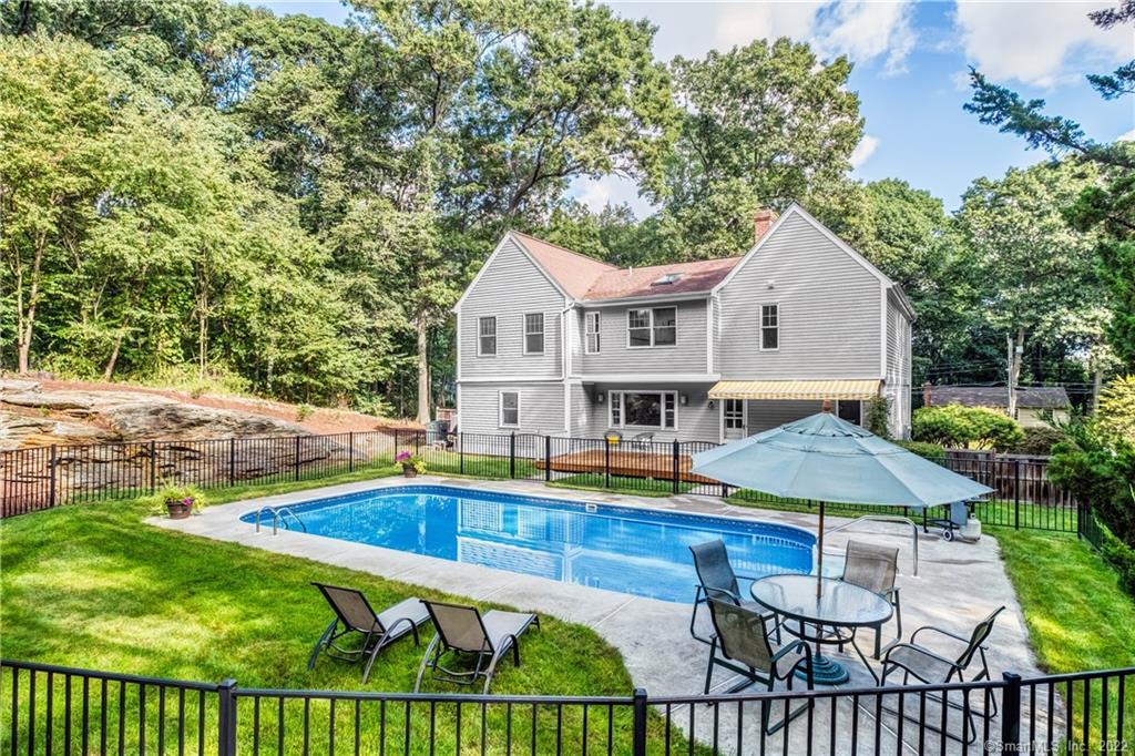 280 Rock Ridge Road Fairfield, CT 06824 - Photo 1 of 1 a view of house with swimming pool yard and outdoor seating