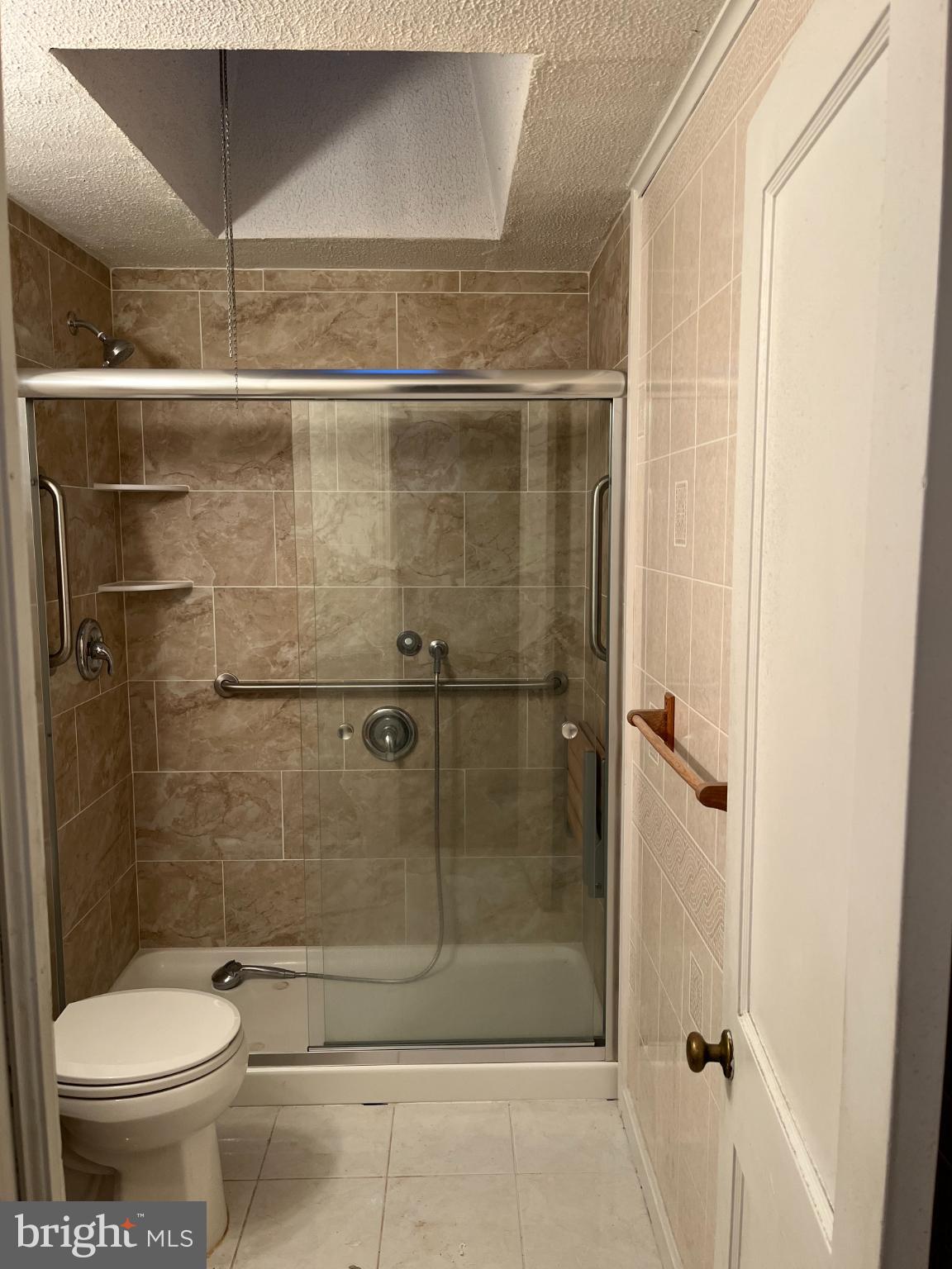 810 Bennington Road Folcroft, PA 19032 - Photo 14 of 24 Modern bathroom with elegant tile design.