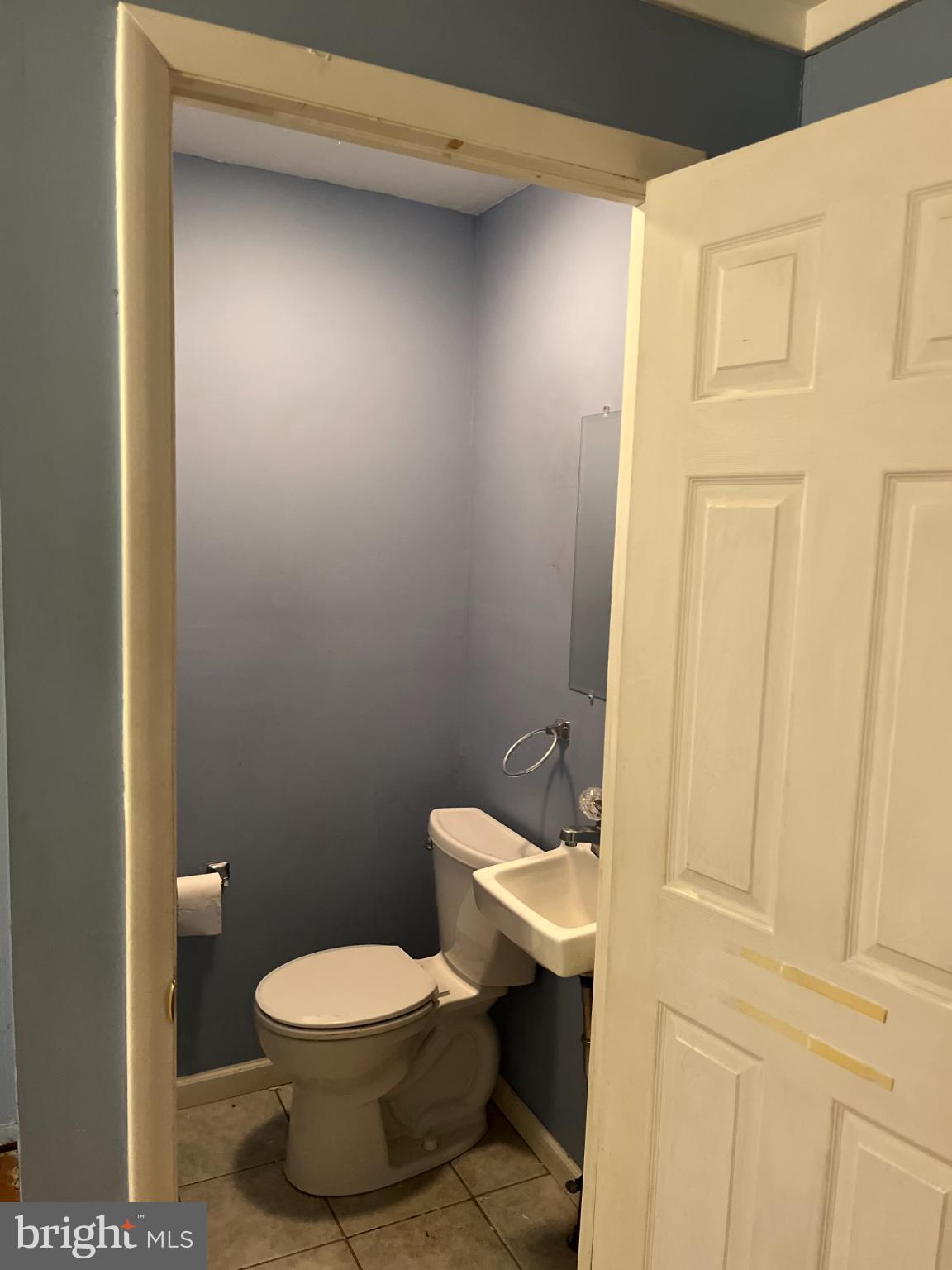 810 Bennington Road Folcroft, PA 19032 - Photo 8 of 24 Charming half-bath with serene blue walls.