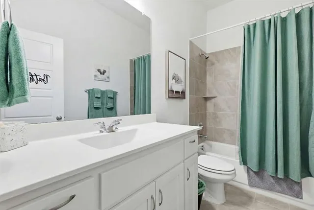 a bathroom with a double vanity sink mirror and double