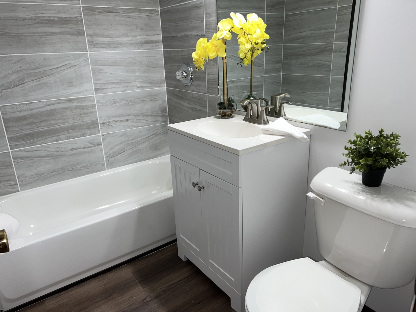 101 Louis Road Joliet, IL 60433 - Photo 11 of 17 a bathroom with a sink a toilet and shower