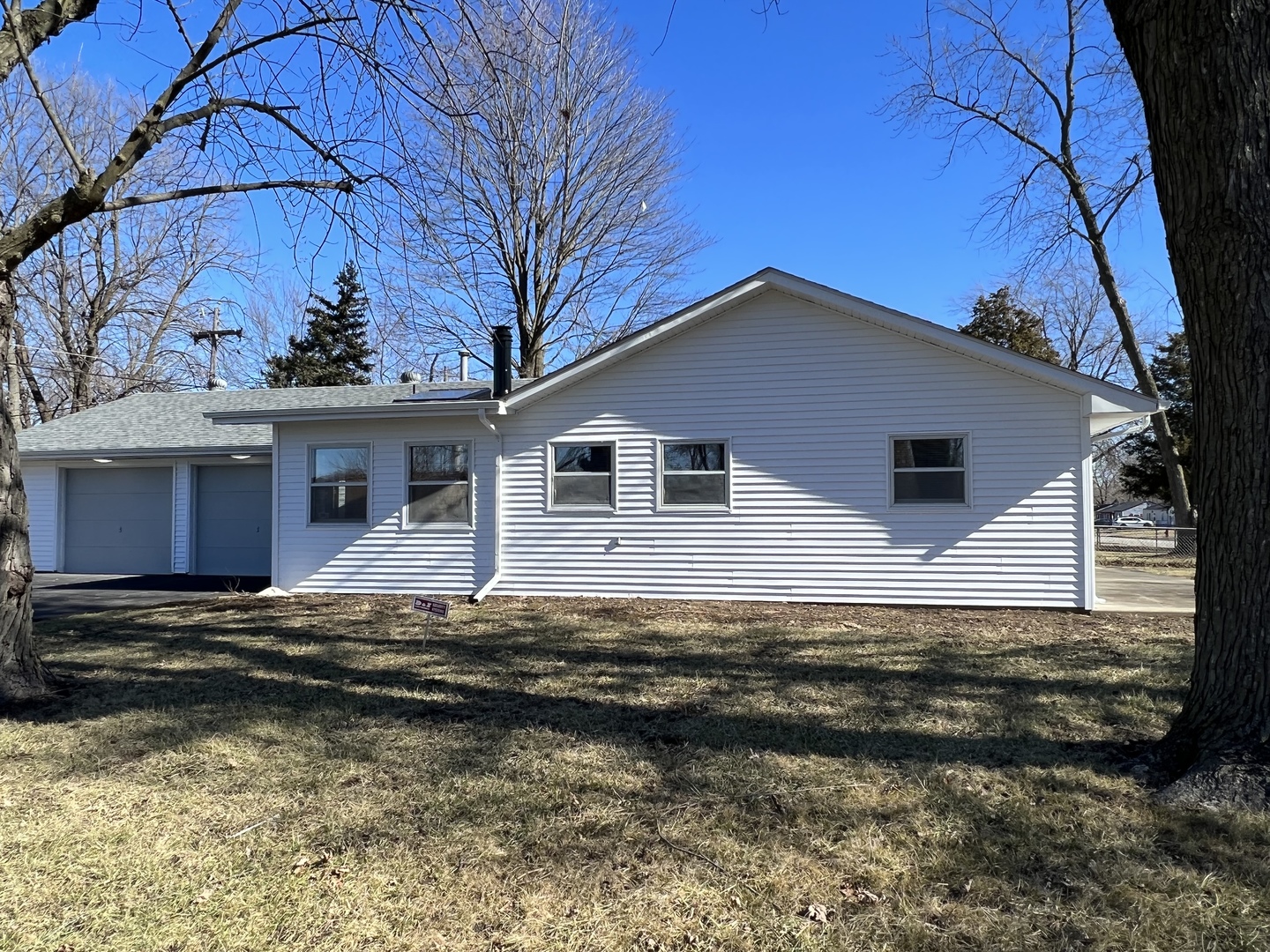 101 Louis Road Joliet, IL 60433 - Photo 2 of 17 a view of a house with a yard